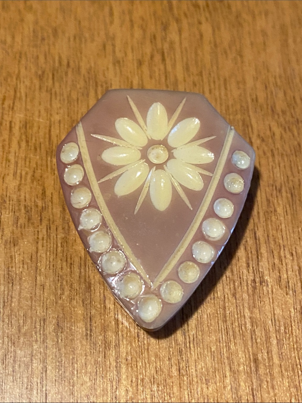 Bakelite art deco dress clip Floral Shield - Cream on Mauve